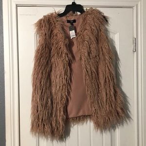 Fur vest. Brand new, still has tags.